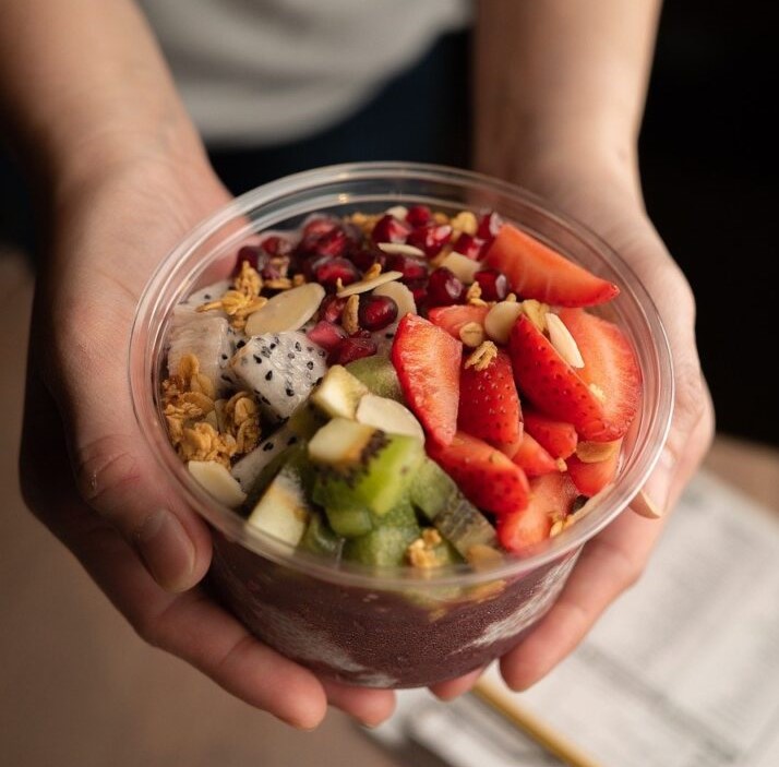 offering a bowl of food